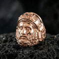 Load image into Gallery viewer, Rose gold plated Hephaestus ring on volcanic rock, myth-inspired signet ring featuring powerful bearded forge god face