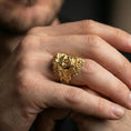 Load image into Gallery viewer, Gold plated Zeus mythology ring worn on finger, statement signet style inspired by ancient Greek gods, premium lifestyle close-up