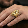 Load image into Gallery viewer, Gold plated Zeus signet ring worn on finger, statement mythology jewelry inspired by Jupiter and ancient Greek gods, premium lifestyle close-up