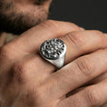 Load image into Gallery viewer, Polished sterling silver samurai warrior ring on a human finger, samurai mask engraving, clean metal finish, bold signet style