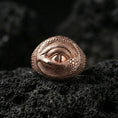 Load image into Gallery viewer, Rose gold plated dragon eye ring on black volcanic stone, scaled dragon skin texture with eye motif, gothic accessory