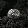 Load image into Gallery viewer, Polished sterling silver dragon eye ring on black volcanic stone, realistic scaled texture with central eye, fantasy statement ring