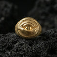 Load image into Gallery viewer, Gold plated dragon eye ring on black volcanic stone, sculpted reptilian eye design, dark fantasy jewelry
