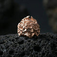 Load image into Gallery viewer, Rose gold plated Medusa head ring on black volcanic stone, sculpted gorgon portrait with serpents, mythic signet ring