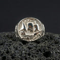 Load image into Gallery viewer, Polished sterling silver Flying Dutchman ship signet ring on black volcanic stone, engraved sailing vessel design, nautical jewelry