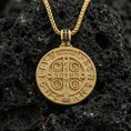 Load image into Gallery viewer, Gold plated St. Benedict medallion necklace on black volcanic stone, religious protection charm pendant, braided chain