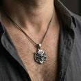 Load image into Gallery viewer, Oxidized sterling silver samurai skull pendant worn on a human neck, kabuto helmet and crossed katanas statement necklace
