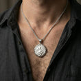 Load image into Gallery viewer, Polished silver Saint Gabriel medallion necklace worn on neck, close lifestyle crop, clear archangel relief and border details