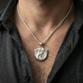 Load image into Gallery viewer, Polished silver dragon pendant on model, clean fantasy amulet necklace styling with coiled dragon design