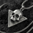Load image into Gallery viewer, Oxidized sterling silver Absolute’s talisman skull pendant on volcanic rock, Baldur’s Gate 3 cult amulet, macro close-up