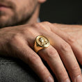 Load image into Gallery viewer, Gold plated Virgin Mary signet ring worn on finger, Catholic devotional ring gift, premium lifestyle framing