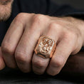 Load image into Gallery viewer, Rose gold plated Holy Family ring worn on finger, Holy Family portrait relief ring, devotional jewelry lifestyle close-up