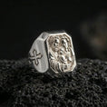 Load image into Gallery viewer, Polished silver Holy Family signet ring on porous volcanic stone, detailed family portrait engraving, Catholic jewelry macro