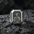 Load image into Gallery viewer, Oxidized sterling silver St Jude signet ring on volcanic rock, saint relief portrait, cross side engraving