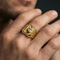 Load image into Gallery viewer, Gold plated cross heart ring worn on finger, sacred heart and cross relief, signet ring for men