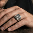 Load image into Gallery viewer, Oxidized sterling silver Our Lady of Guadalupe ring worn on finger, Marian relief detail, cross shoulder engraving close-up