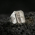 Load image into Gallery viewer, Polished silver St Dominic ring on porous volcanic stone, detailed saint portrait carving, Catholic signet jewelry