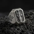 Load image into Gallery viewer, Oxidized sterling silver St Dominic signet ring on volcanic rock, saint relief holding book, cross shoulder engraving