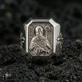 Load image into Gallery viewer, Polished silver St Patrick ring on porous volcanic stone, detailed saint portrait carving, Catholic signet jewelry