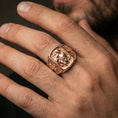 Load image into Gallery viewer, Rose gold plated St Sebastian signet ring worn on finger, saint Sebastian relief with cross shoulders, faith jewelry band