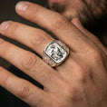 Load image into Gallery viewer, Polished silver St Sebastian signet ring worn on finger, saint engraving close-up, Christian protection ring for daily wear