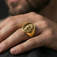 Load image into Gallery viewer, Gold plated Jesus signet ring worn on finger, statement Christian jewelry gift for him closeup