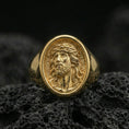 Load image into Gallery viewer, Gold plated Jesus signet ring on volcanic rock, crown of thorns devotional ring for men closeup