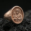 Load image into Gallery viewer, Rose gold plated Saint Joseph ring on volcanic stone, Holy Family relief signet macro detail