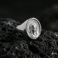 Load image into Gallery viewer, Polished silver Virgin Mary ring on porous volcanic stone, detailed Madonna portrait engraving, religious signet ring