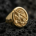Load image into Gallery viewer, Gold plated St. Michael signet ring on dark volcanic rock, archangel Michael victory design, Catholic protection ring
