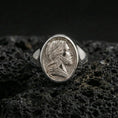 Load image into Gallery viewer, Polished silver Jesus portrait ring on volcanic stone, Christian signet jewelry closeup