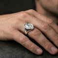 Load image into Gallery viewer, Polished silver Jesus Shepherd signet ring worn on finger, detailed Christ relief, religious accessory