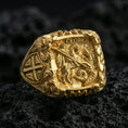 Load image into Gallery viewer, Gold plated sterling silver St George defeating dragon ring on dark volcanic rock, medieval warrior signet with cross motif