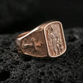 Load image into Gallery viewer, Rose gold plated Saint Roch signet ring on volcanic stone, Saint Roch and dog motif, faith-inspired signet face with detailed engraving