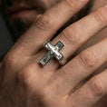 Load image into Gallery viewer, Polished silver Jesus crucifix ring worn on finger, detailed Christ figure engraving, modern cross statement jewelry