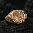 Load image into Gallery viewer, Rose gold plated Good Shepherd signet ring on volcanic stone, oval Jesus and lamb relief signet ring with premium handcrafted finish