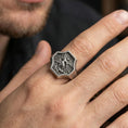 Load image into Gallery viewer, Oxidized 925 sterling silver Saint Michael ring worn on finger, octagon signet relief with angel slaying dragon scene