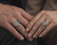 Load image into Gallery viewer, Oxidized sterling silver Our Lady of Guadalupe signet ring worn on male hand as religious jewelry