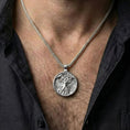 Load image into Gallery viewer, Polished silver sacred tree goddess necklace worn on chest highlighting earth mother symbolism