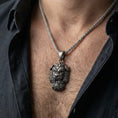 Load image into Gallery viewer, Oxidized Fu Dog pendant necklace worn on male model as a protective guardian lion talisman