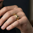 Load image into Gallery viewer, Gold plated faceted modern ring worn by man as a powerful minimalist wedding or commitment band