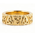 Load image into Gallery viewer, Gold Celtic trinity knot band ring displayed on white surface as symbolic jewelry