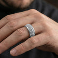Load image into Gallery viewer, Polished silver ancient Greek crowd rotating ring worn on hand highlighting clean shine, detailed relief, and everyday premium wear