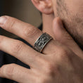 Load image into Gallery viewer, Oxidized Maltese cross Knights Hospitaller band ring worn on finger as a bold crusader heritage statement piece with engraved fleur de lis accents