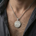 Load image into Gallery viewer, Polished silver triple moon pentagram necklace worn on neck, Celtic knotwork medallion with pentacle center