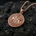 Load image into Gallery viewer, Rose gold plated triple moon pentagram medallion on dark volcanic stone, Celtic knot border and pentacle center