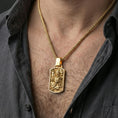Load image into Gallery viewer, Gold plated foo dog pendant worn on neck, Chinese guardian lion dog tag necklace with detailed relief on braided chain