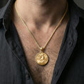 Load image into Gallery viewer, Gold plated Athena pendant necklace worn on neck, Greek goddess warrior coin medallion with helmet and battle relief