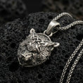 Load image into Gallery viewer, Oxidized 925 sterling silver Fenrir wolf pendant on volcanic rock, Norse Viking necklace with Celtic knotwork and wolf head relief