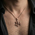 Load image into Gallery viewer, Rose gold plated trinacria triskelion pendant worn on neck, sicily medusa medallion necklace elegant daily styling